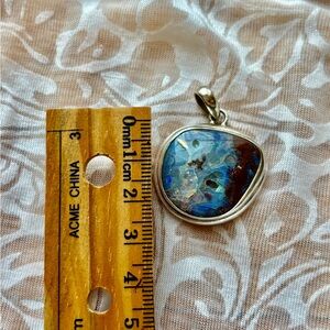 Natural Opal Pendant set in silver